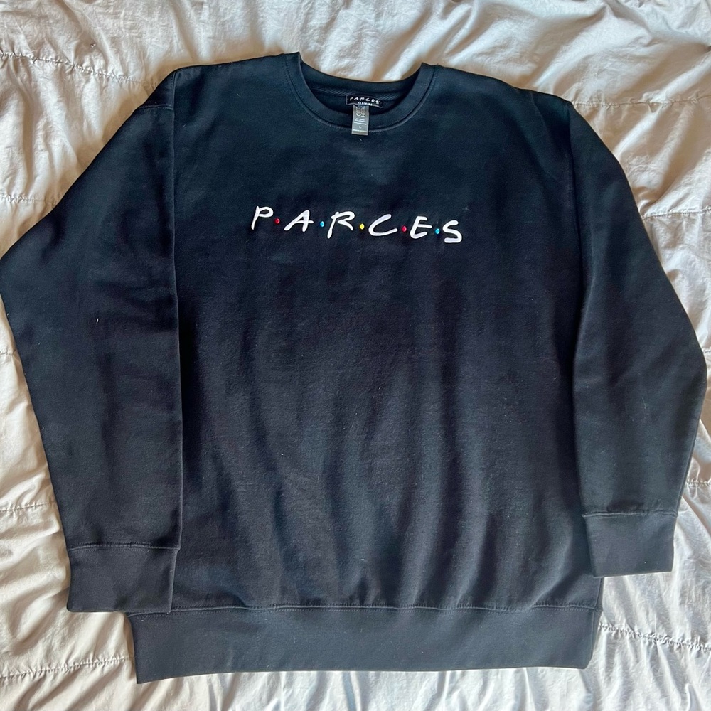 Black sweatshirt embroidered with PARCES Colombian for FRIENDS logo size Large.